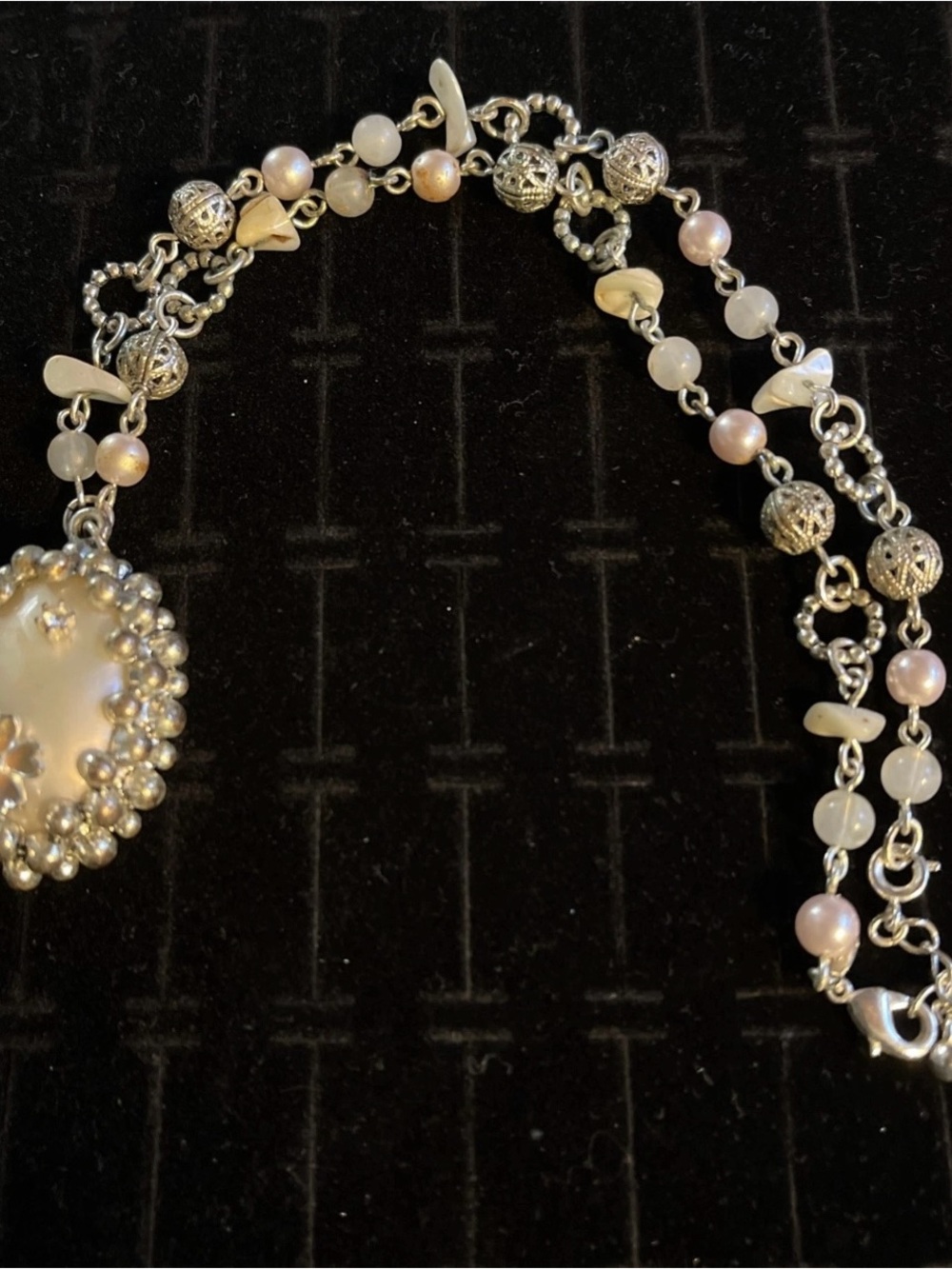 Vintage Avon SP beaded pendant with flowers and rhinestones.